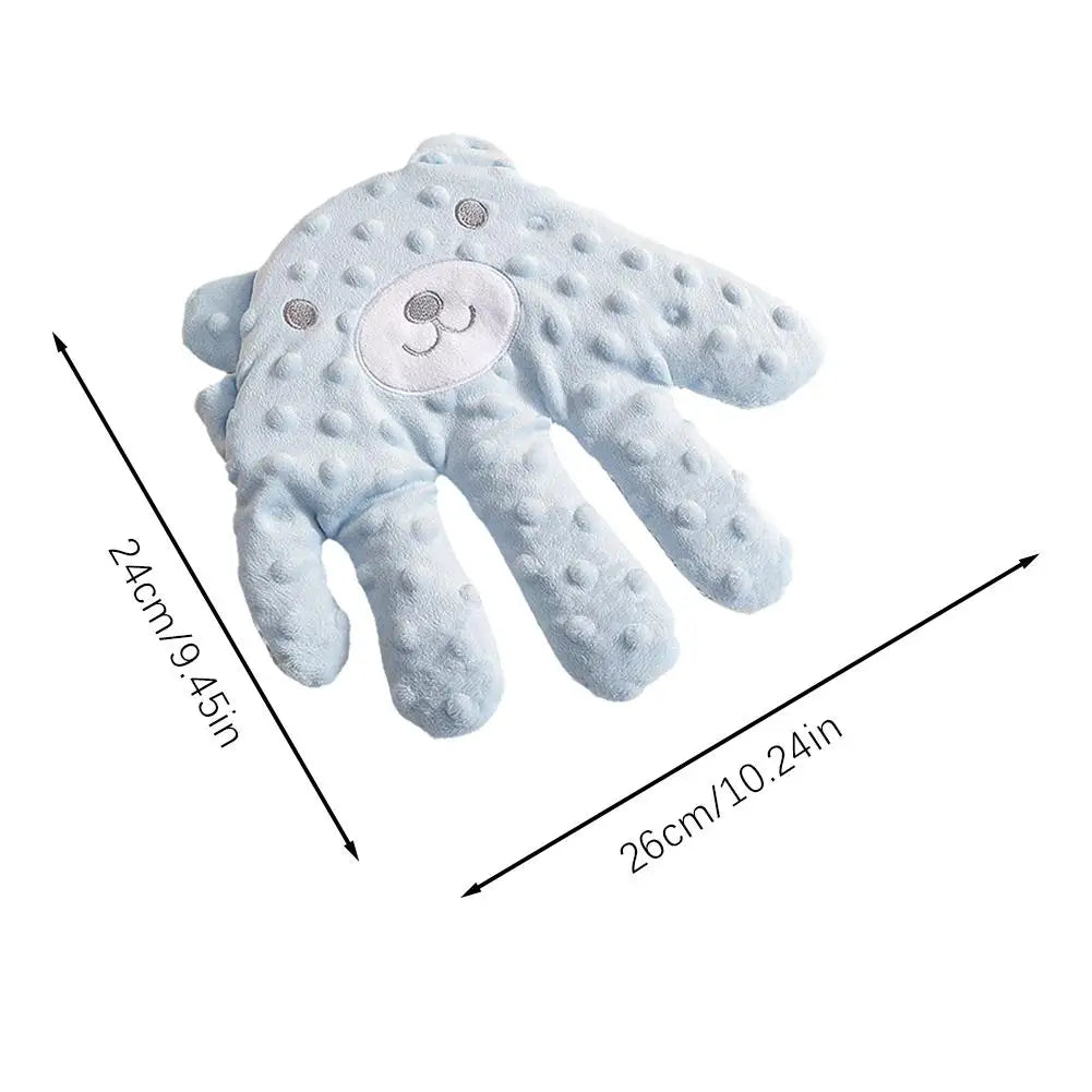Coussin main dimension 